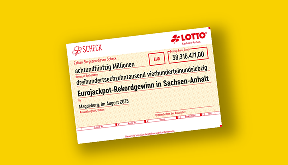 symbolischer Scheck für 58-Millionen-Euro-Gewinn bei LOTTO Sachsen-Anhalt